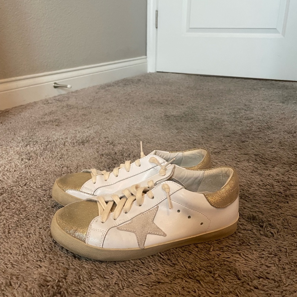 Golden Goose white and gold superstars